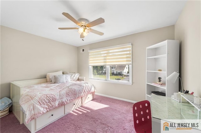 carpeted bedroom with ceiling fan