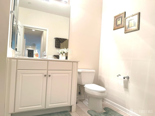 2109 Conrad Way, Franklin, NJ 08873 - bathroom with toilet, vanity, tile patterned floors, and baseboards