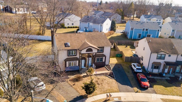 birds eye view of property with a residential view