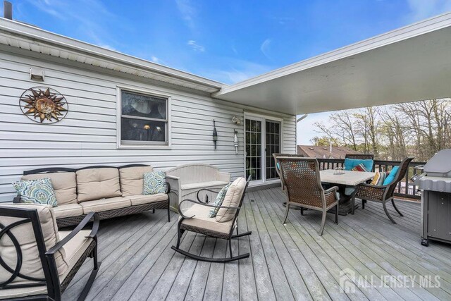 6 Muravski Ct, South River, NJ 08882 - wooden deck with an outdoor living space, outdoor dining space, and area for grilling