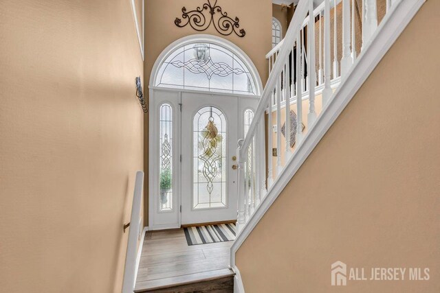 6 Muravski Ct, South River, NJ 08882 - entrance foyer with a high ceiling and wood finished floors