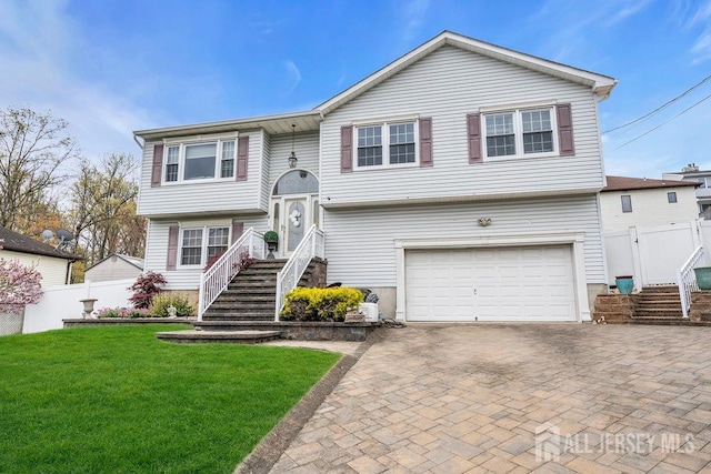 6 Muravski Ct, South River, NJ 08882 - raised ranch with a garage and decorative driveway