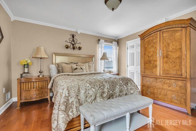 6 Muravski Ct, South River, NJ 08882 - bedroom with wood finished floors and crown molding