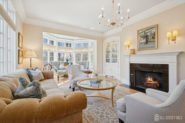 56 Cradle Rock Rd, Princeton, NJ 08540 - living area with a chandelier, crown molding, a premium fireplace, and light wood finished floors