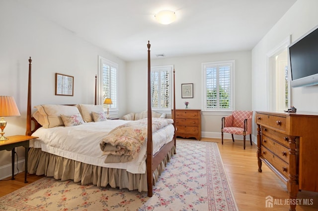 56 Cradle Rock Rd, Princeton, NJ 08540 - bedroom with multiple windows and light wood-type flooring