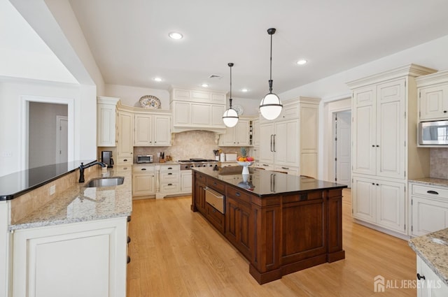 56 Cradle Rock Rd, Princeton, NJ 08540 - kitchen featuring stainless steel appliances, light wood-style flooring, tasteful backsplash, and recessed lighting