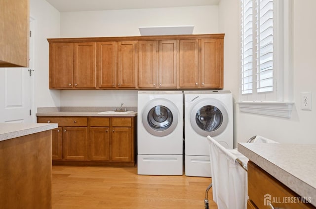 56 Cradle Rock Rd, Princeton, NJ 08540 - laundry room featuring washer and clothes dryer, cabinet space, and light wood finished floors