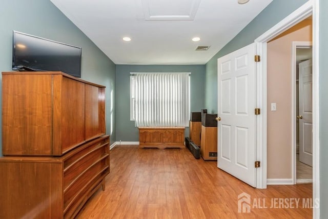 interior space with light wood-style flooring, recessed lighting, baseboards, and visible vents