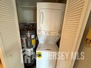 2112 Ravens Crest Dr, Plainsboro, NJ 08536 - washroom with water heater, stacked washer and clothes dryer, and laundry area
