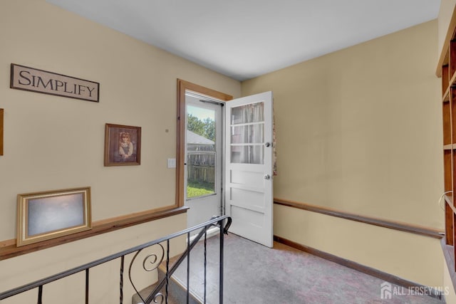 28 Lehigh St, Dunellen, NJ 08812 - hallway featuring light colored carpet and baseboards