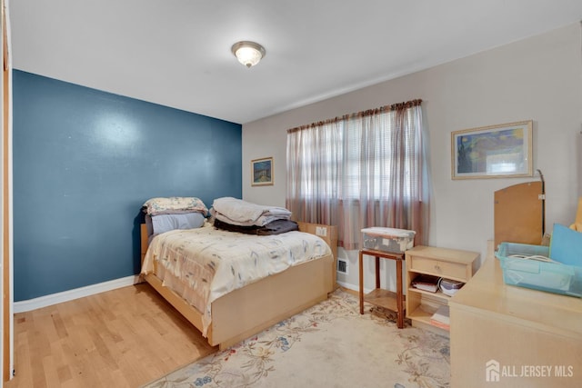 28 Lehigh St, Dunellen, NJ 08812 - bedroom with wood finished floors and baseboards