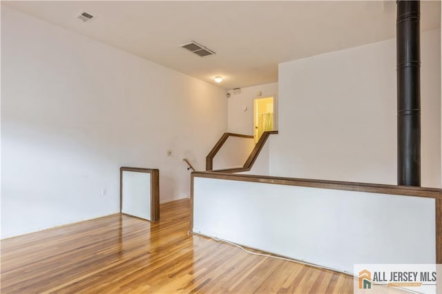 323 Gills Ln Unit 9C, Iselin, NJ 08830 - unfurnished room featuring light wood-style floors