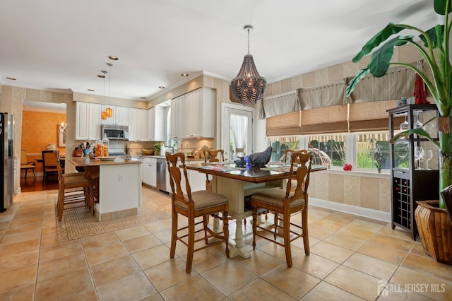 tiled dining area with sink