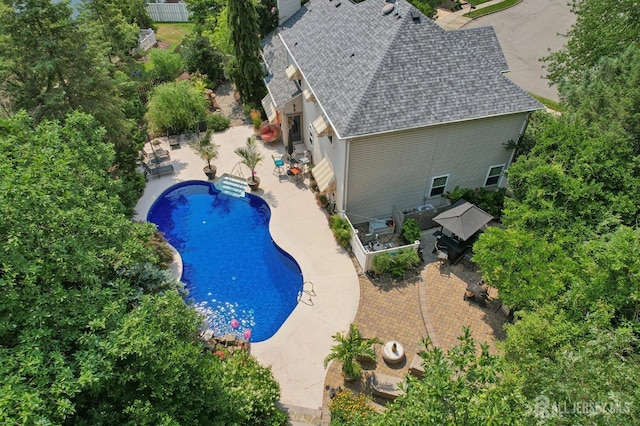 view of swimming pool featuring a patio