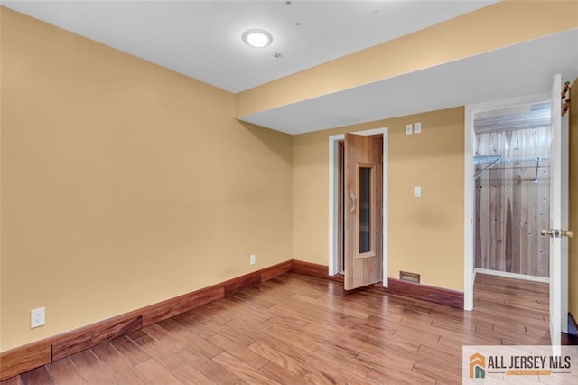 10 Signal Ct, South Brunswick, NJ 08810 - basement with baseboards and wood finished floors