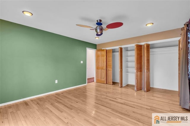 10 Signal Ct, South Brunswick, NJ 08810 - unfurnished bedroom featuring light wood finished floors, baseboards, two closets, and a ceiling fan