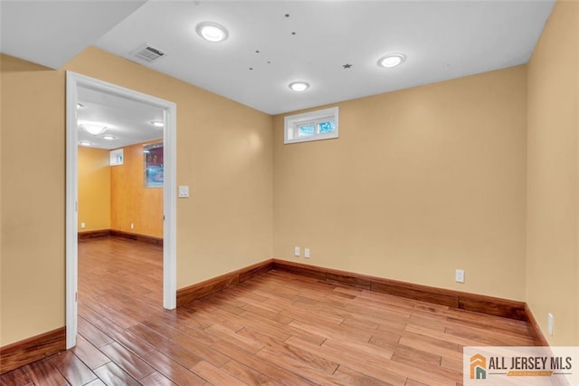 10 Signal Ct, South Brunswick, NJ 08810 - unfurnished room with wood finished floors and baseboards