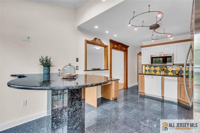 10 Signal Ct, South Brunswick, NJ 08810 - kitchen with white dishwasher, stainless steel microwave, granite floors, tasteful backsplash, and recessed lighting