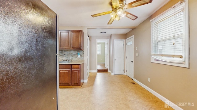 811 Shore Concourse, Keyport, NJ 07735 - corridor with baseboards, plenty of natural light, and a sink