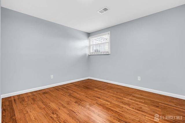 34 Sims Rd, Edison, NJ 08817 - unfurnished room featuring baseboards and wood finished floors