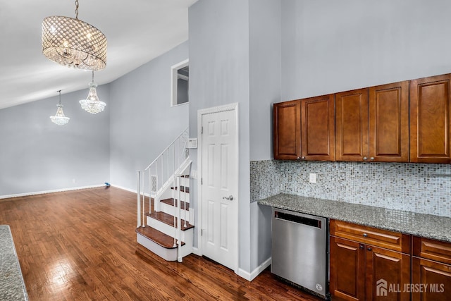 34 Sims Rd, Edison, NJ 08817 - kitchen with stainless steel dishwasher, a chandelier, decorative backsplash, dark wood finished floors, and high vaulted ceiling