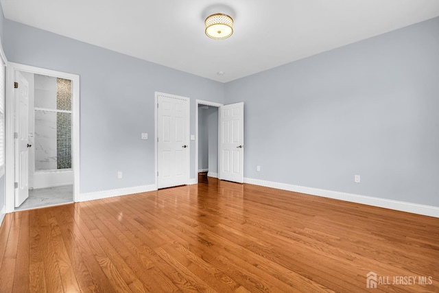 34 Sims Rd, Edison, NJ 08817 - unfurnished bedroom featuring wood finished floors and ensuite bathroom