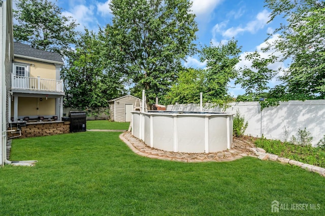 34 Sims Rd, Edison, NJ 08817 - view of yard with a storage unit and an outdoor pool