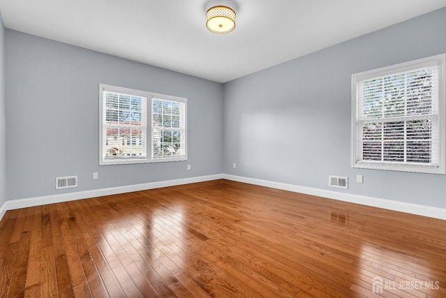 34 Sims Rd, Edison, NJ 08817 - empty room featuring wood-type flooring and plenty of natural light