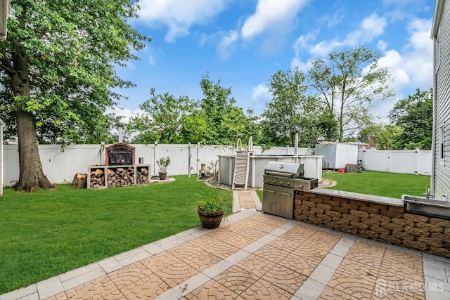 34 Sims Rd, Edison, NJ 08817 - fenced backyard with a patio area, a storage shed, and a gate