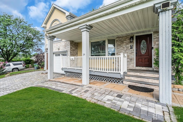 34 Sims Rd, Edison, NJ 08817 - doorway to property featuring covered porch and stone siding