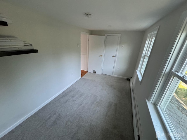 unfurnished bedroom featuring carpet flooring