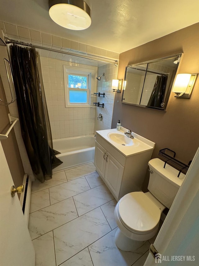 full bathroom featuring toilet, shower / bath combo with shower curtain, and vanity