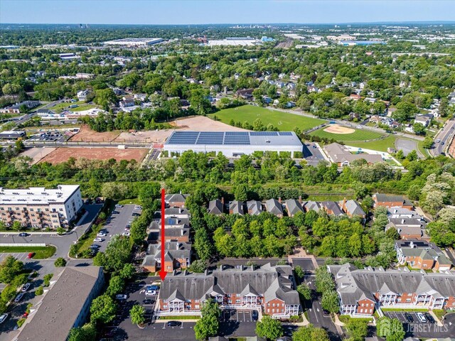 aerial view of property's location featuring nearby suburban area