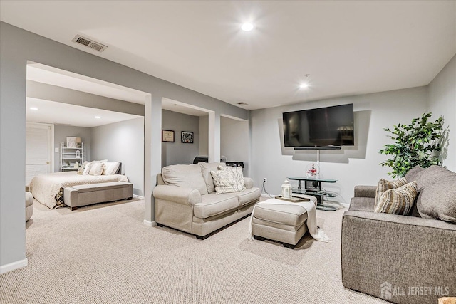 living area with carpet flooring, recessed lighting, and baseboards