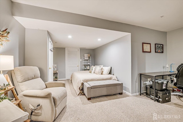 carpeted bedroom featuring recessed lighting and baseboards