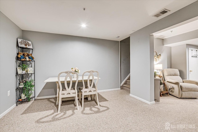 dining room with carpet, stairs, baseboards, and recessed lighting