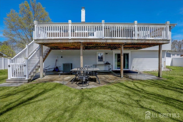 16 Dutch Valley Rd, Howell, NJ 07731 - rear view of house with a patio, a wooden deck, and stairway