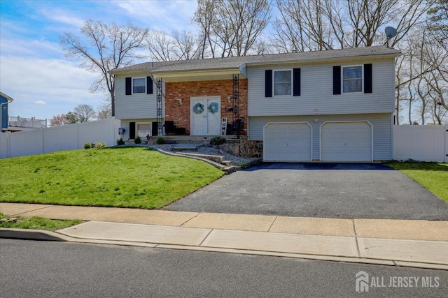 16 Dutch Valley Rd, Howell, NJ 07731 - raised ranch featuring driveway and an attached garage