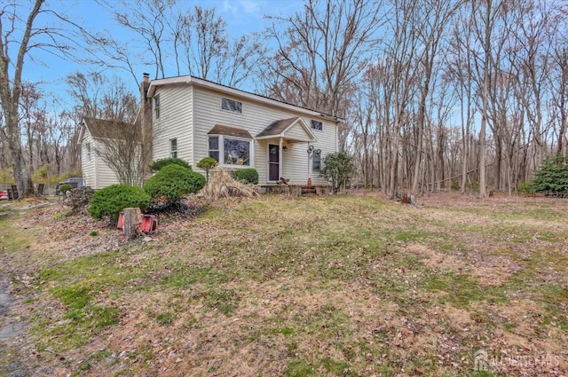 54 E Greystone Rd, Old Bridge, NJ 08857 - traditional-style house with a chimney