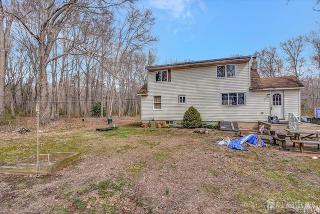 54 E Greystone Rd, Old Bridge, NJ 08857 - back of house with a chimney