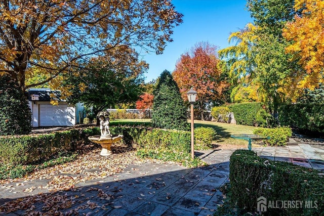 view of yard with a garage