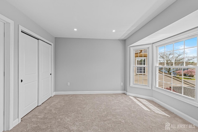 3 Bristol Ct Unit D, Monroe, NJ 08831 - unfurnished bedroom featuring carpet, baseboards, recessed lighting, and a closet
