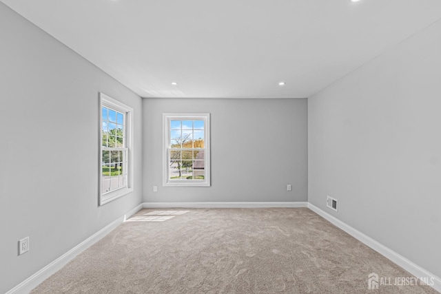 3 Bristol Ct Unit D, Monroe, NJ 08831 - spare room featuring carpet flooring, baseboards, and recessed lighting