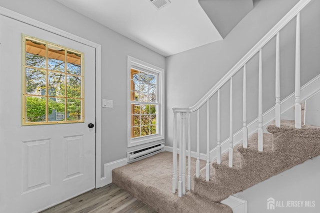 3 Bristol Ct Unit D, Monroe, NJ 08831 - foyer entrance featuring wood finished floors, a baseboard radiator, and baseboards