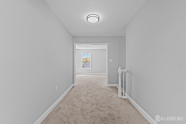 3 Bristol Ct Unit D, Monroe, NJ 08831 - hall with an upstairs landing, carpet flooring, and baseboards
