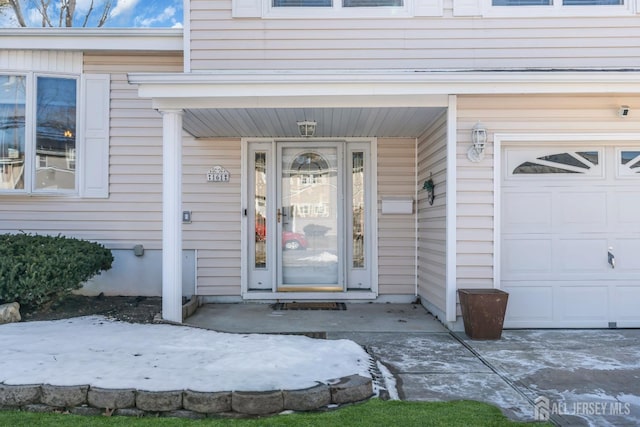 property entrance featuring a garage