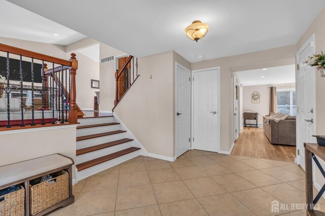 view of tiled entrance foyer