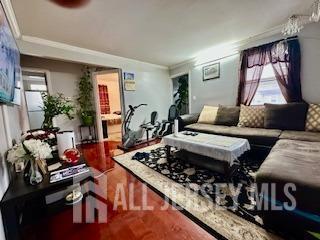 living room with crown molding