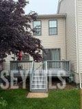 13 Heritage Ln, Fords, NJ 08863 - back of house featuring a deck, stairway, and a lawn