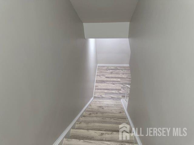 13 Heritage Ln, Fords, NJ 08863 - stairs featuring wood finished floors and baseboards